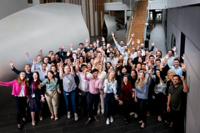 Newly graduated Vestas employees gather at Vestas headquarters in Aarhus for a panel discussion, Q&A, and to celebrate their accomplishments. 