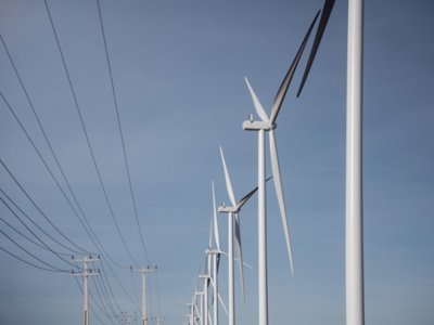 The wind turbine V150-4.2 MW™.  It has a wind turbine blade size of 73.7 meters and a wind turbine height of 150 meters.