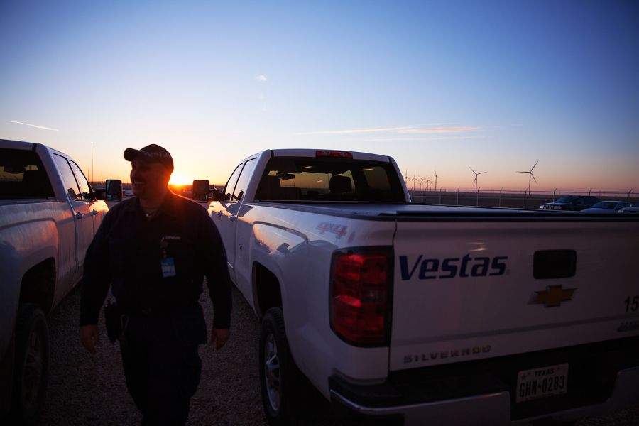 Service technician beside Vestas vehicles; contextual maintenance image.